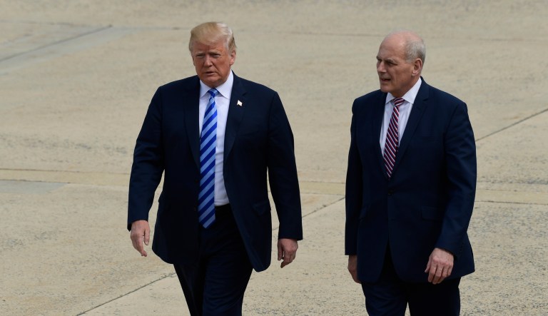 President Trump and White House chief of staff John Kelly walk on the tarmac at Andrews Air Force Base before boarding Air Force One. 