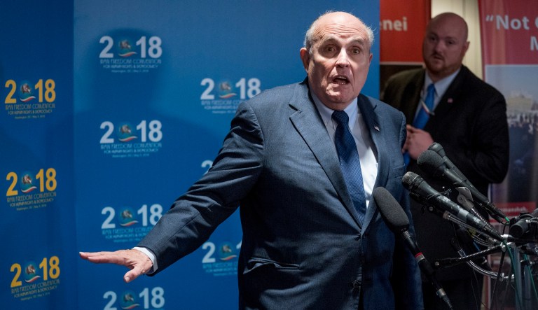 Rudy Giuliani, an attorney for President Trump, speaks to reporters in Washington. 