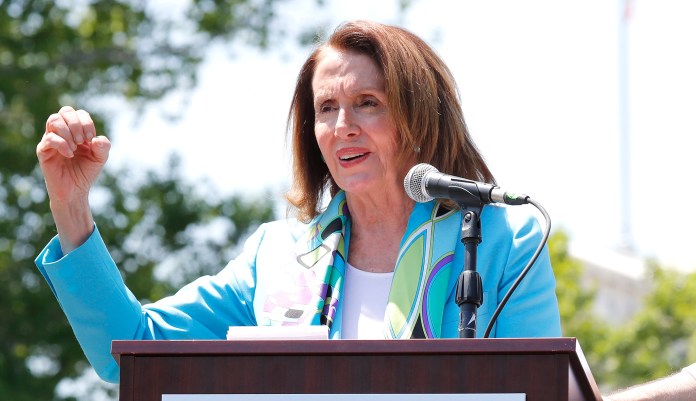 House Minority Leader Nancy Pelosi speaks on the East lawn of the U.S. Capitol Building. 
