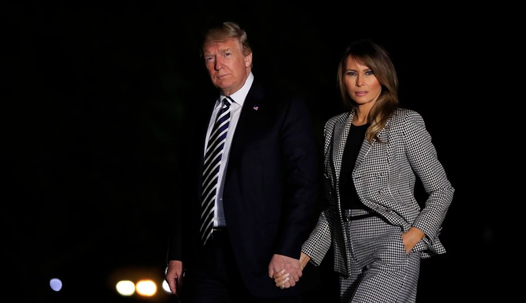 President Trump with first lady Melania Trump returns to the White House in Washingtonr. 