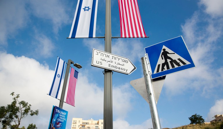 A road sign leading to the U.S. Embassy is seen ahead the official opening in Jerusalem. 