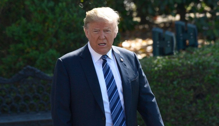 President Trump walks over to reporters before heading to Marine One on the South Lawn of the White House. 