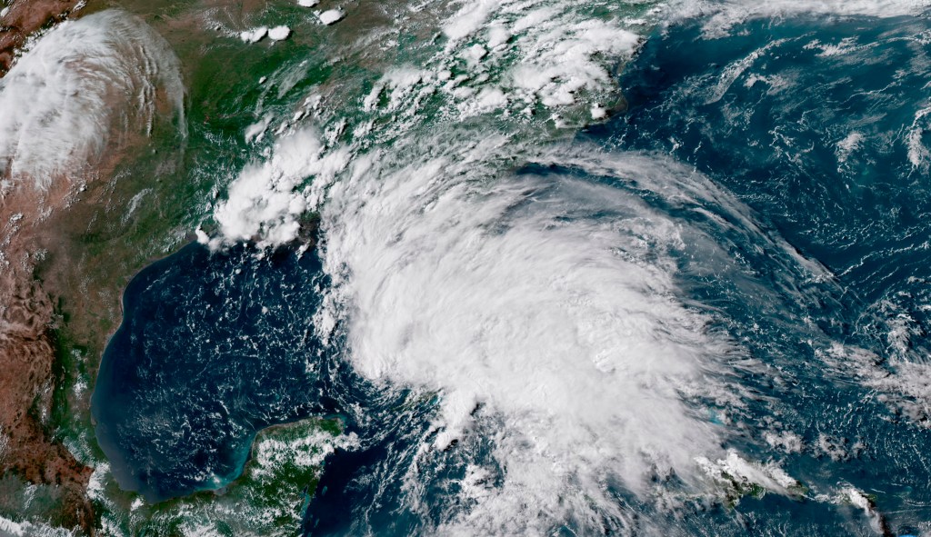 Two journalists covering Alberto killed when tree crushes news van
