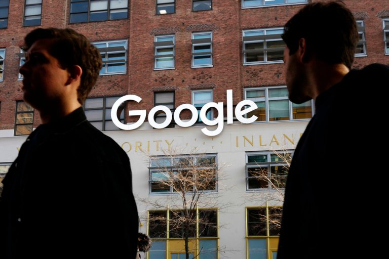 In this Dec. 4, 2017, photo, people walk by Google offices in New York. 