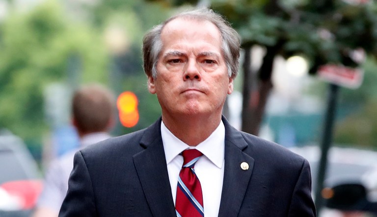 James Wolfe, former director of security with the Senate Intelligence Committee, walks to the Washington Field Office of the FBI in Washington. 