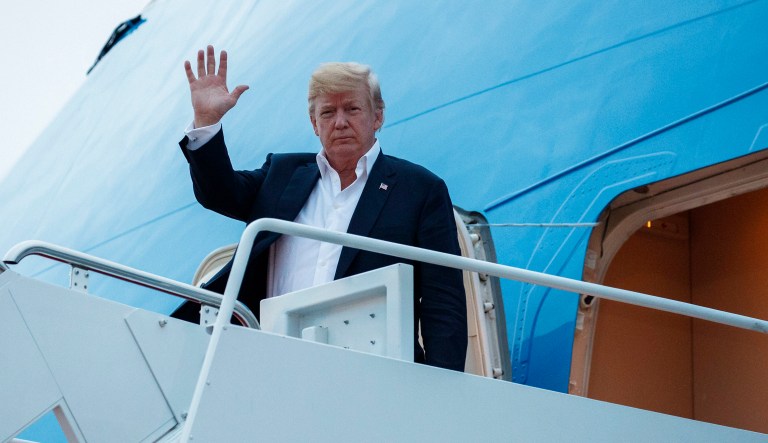 President Trump arrives at Andrews Air Force Base after a summit with North Korean leader Kim Jong Un in Singapore. 