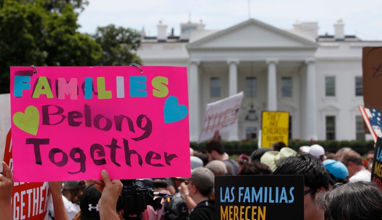 Activists march past the White House to protest the Trump administration's approach to illegal border crossings and separation of children from immigrant parents in Washington.