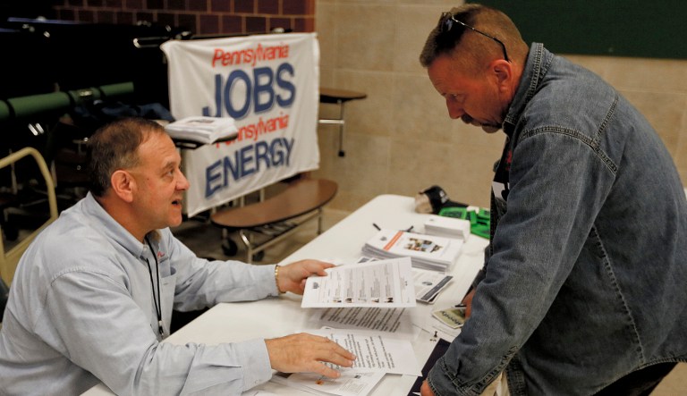 June beats expectations with 213,000 new payroll jobs, unemployment at 4 percent A recruiter in the shale gas industry, left, speaks with an attendee of a job fair. Economists have estimated that 195,000 jobs were added last month and that the unemployment rate remained at an 18-year low of 3.8 percent, according to data provider FactSet.