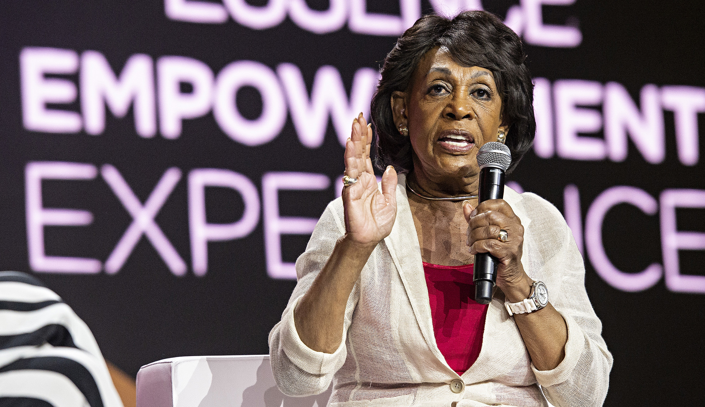 Maxine Waters asks supporters not to confront armed protesters outside her office