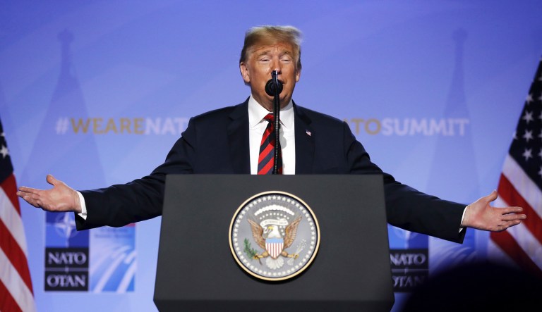 President Trump speaks during a press conference after a summit of heads of state and government at NATO headquarters in Brussels. 
