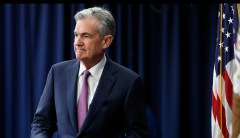 Fed leaves interest rates alone, resisting Trump’s pressure for a cut