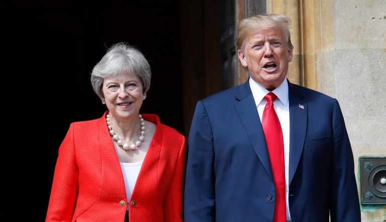 President Trump stands with British Prime Minister Theresa May at Chequers, in Buckinghamshire, England.