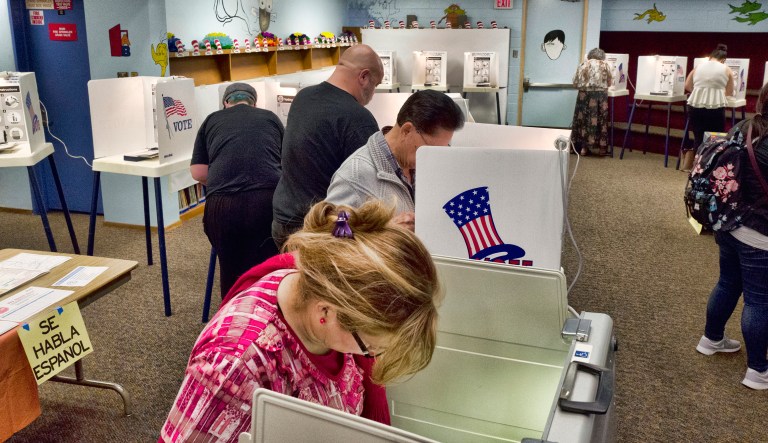 Voters mark ballots at a polling place in Los Angeles. 