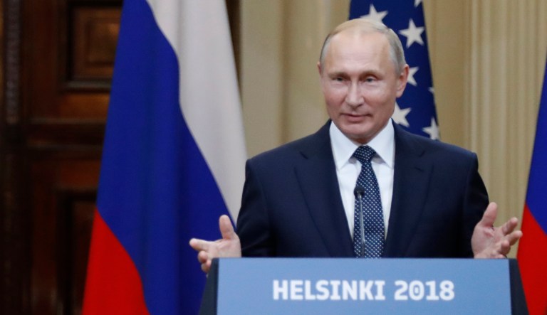 Russian President Vladimir Putin speaks during a press conference in Helsinki. 