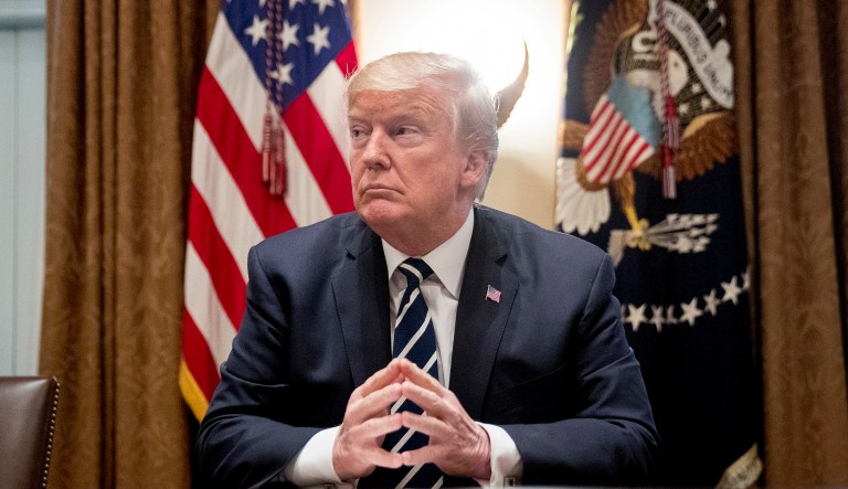 President Trump says he meant the opposite when he said in Helsinki that he doesn't see why Russia would have interfered in the 2016 U.S. elections. 