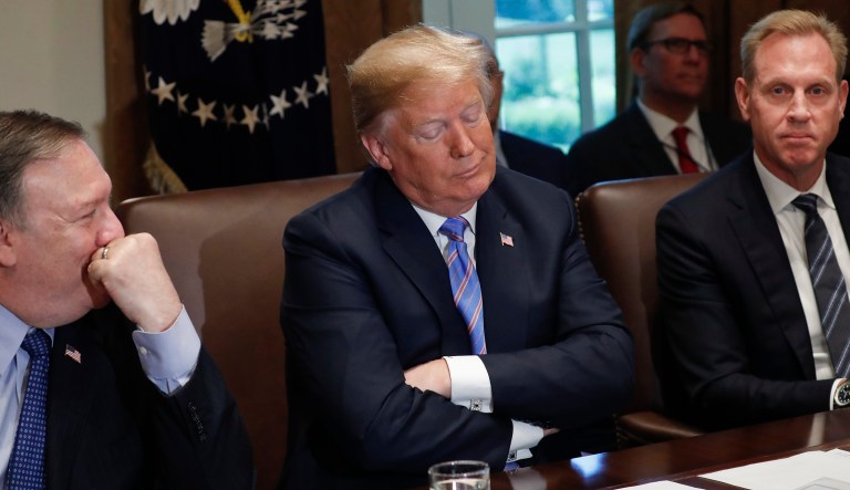 President Trump reacts to a question from a member of the media during his meeting with members of his Cabinet at the White House on July 18, 2018.