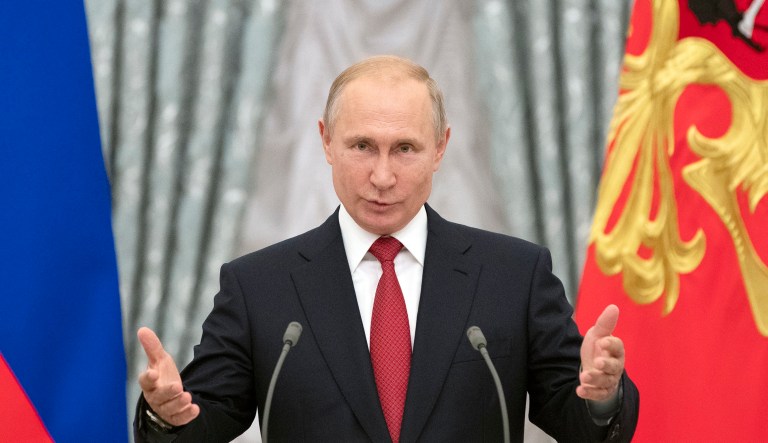 Russian President Vladimir Putin speaks. 