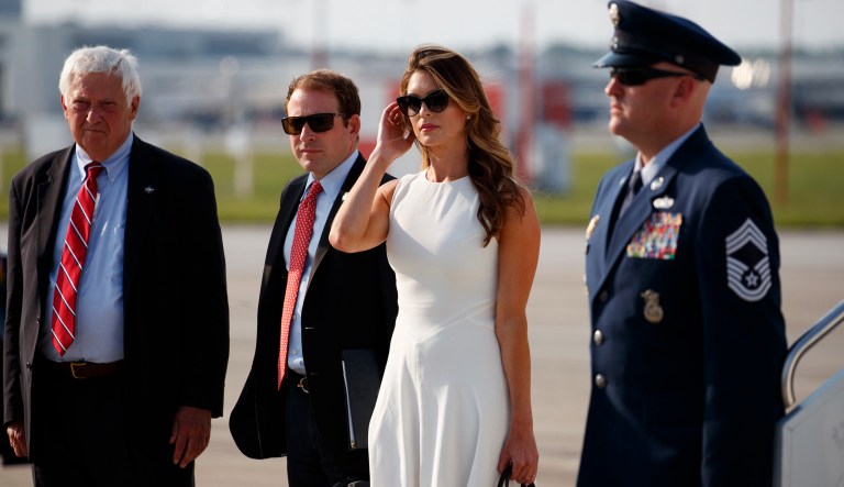 Hope Hicks stands on the tarmac as President Trump is greeted as he arrives on Air Force One at John Glenn Columbus International Airport in Columbus, Ohio. 