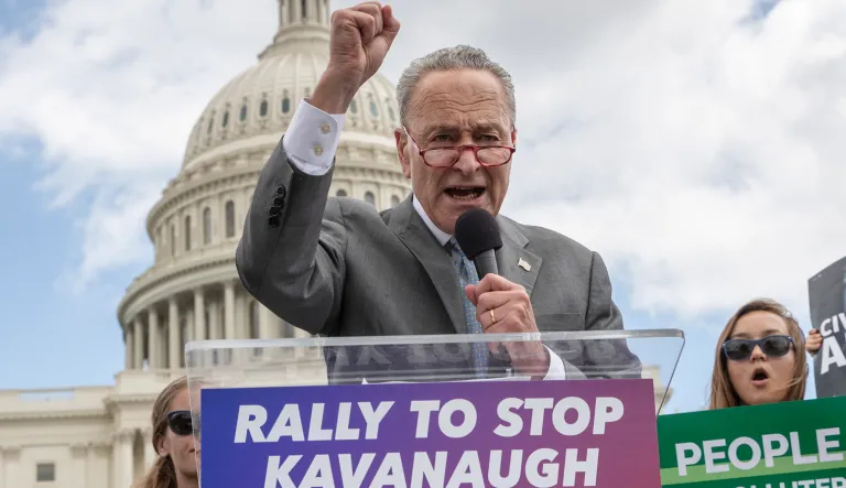 Senate Minority Leader Chuck Schumer, D-N.Y., joins protesters objecting to President Trump's Supreme Court nominee Brett Kavanaugh at a rally Capitol in Washington. 