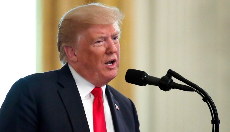 President Trump speaks during a ceremony in the East Room. 
