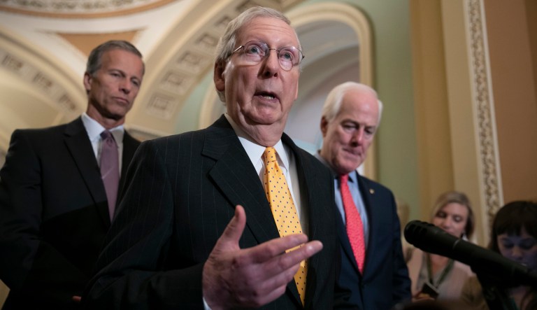 Senate Majority Leader Mitch McConnell, R-Ky., joined by Sen. John Thune, R-S.D., left, and Majority Whip John Cornyn, R-Texas, speaks with reporters following their weekly policy meetings. 