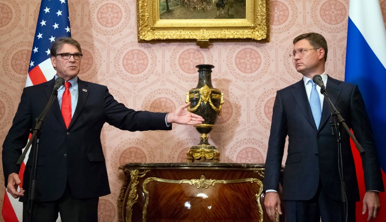 Energy Secretary Rick Perry gestures during a joint news conference with Russian Energy Minister Alexander Novak following their talks in Moscow, Russia. The United States could impose sanctions on a new Russia-Germany gas pipeline, Perry said Thursday. 