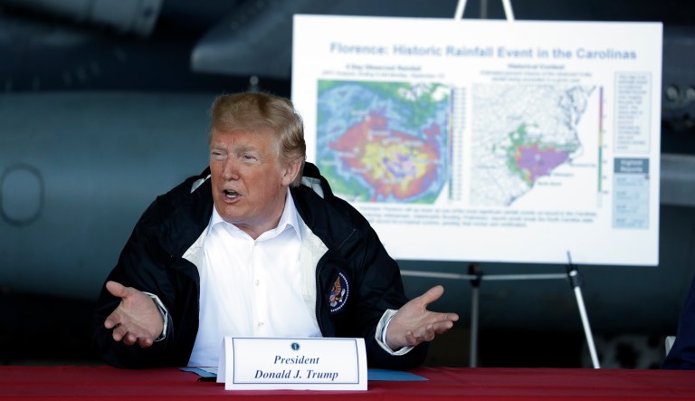 President Trump speaks while attending a briefing after arriving at Marine Corps Air Station Cherry Point to visit areas impacted by Hurricane Florence in Havelock, N.C. 