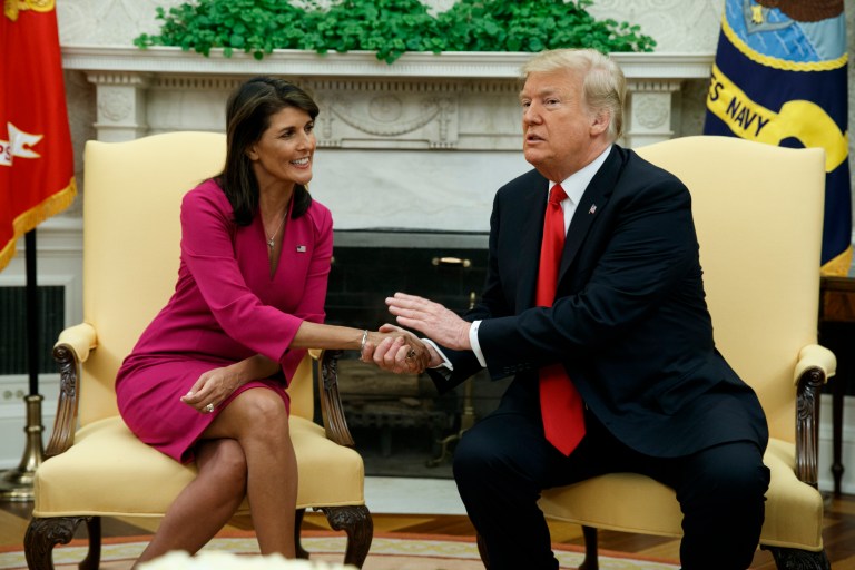 President Donald Trump meets with outgoing U.S. Ambassador to the United Nations Nikki Haley in the Oval Office of the White House, Tuesday, Oct. 9, 2018, in Washington.