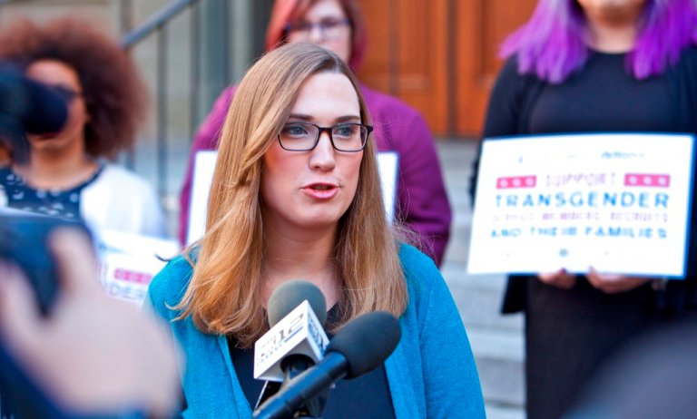 Sarah McBride speaks to reporters after appearing before the U.S. Court of Appeals for the 9th Circuit to urge the court to uphold a district court ruling barring implementation of the Trump administration's effort to ban transgender people from serving openly in the U.S. Armed Services on Wednesday, Oct. 10, 2018, in Portland, Oregon.