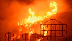 PG&E tumbles amid liability risk in California’s rampaging Camp Fire