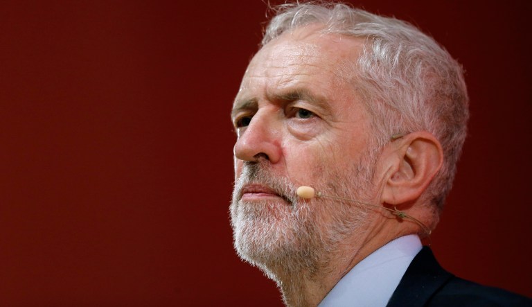 Britain's Labour Party leader Jeremy Corbyn pauses while delivering a speech at the Party of European Socialists congress in Lisbon, Portugal, Friday, Dec. 7, 2018.