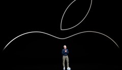 Apple CEO Tim Cook blames trade war with China as he downgrades revenue projections