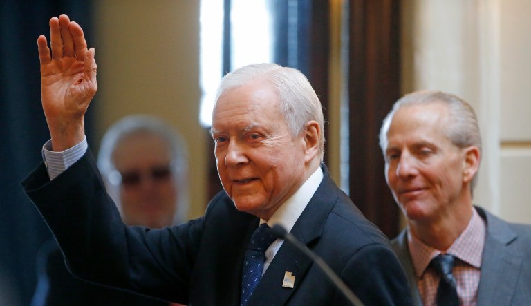 In this Feb. 21, 2018, file photo, Sen. Orrin Hatch, R-Utah, waves after addressing the Utah Senate while Senate President Wayne Niederhauser, R-Sandy, looks on at the Utah State Capitol, in Salt Lake City. 