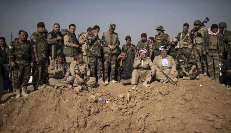 In this Nov. 7, 2016 file photo, Kurdish Peshmerga fighters and commanders overlook Islamic State group positions during heavy fighting in Bashiqa, east of Mosul, Iraq. Over the past century, Kurds in the Mideast have gotten close to setting up their own state or autonomous regions on several occasions only to have their dreams shattered after being abandoned by world powers. The latest instance comes with Syria's Kurds who with U.S. backing have led the fight against the Islamic State group in that country. Now the U.S. plans to withdraw from Syria, leaving the Kurds to face Turkish forces.