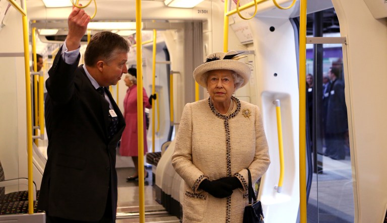 In this Wednesday, March 20, 2013, file photo, Queen Elizabeth II is given a tour of the carriage of a parked train at the Baker Street underground station in London, for a visit to mark the 150th anniversary of the London Underground â her first public engagement in more than a week Wednesday after cancellations following her hospitalization for a stomach bug. 