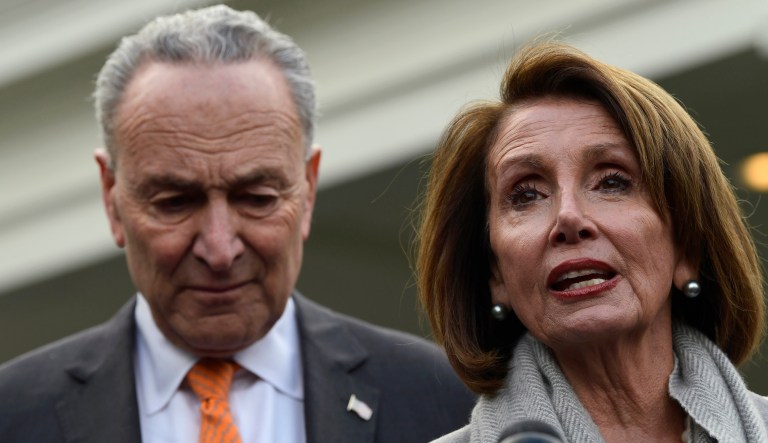 House Speaker Nancy Pelosi of California, right, speaks as she stands next to Senate Minority Leader Sen. Chuck Schumer of New York, left, following their meeting with President Trump at the White House in Washington, Wednesday, Jan. 9, 2019.