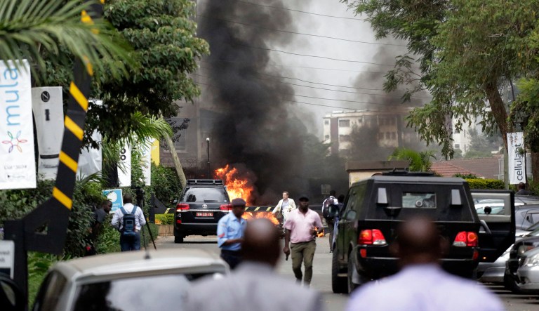 Fire and smoke rises from an explosion in Nairobi, Kenya Tuesday, Jan. 15, 2019. An upscale hotel complex in Kenya's capital came under attack on Tuesday, with a blast and heavy gunfire. The al-Shabab extremist group based in neighboring Somalia claimed responsibility and said its members were still fighting inside.