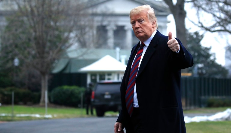 President Trump walks on the South Lawn upon arrival at the White House in Washington, Saturday, Jan. 19, 2019, after attending the casualty return at Dover Air Force Base, Del., for the remains of four Americans killed in a suicide bomb attack in Syria.