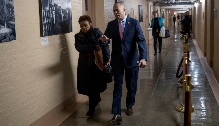 Rep. Barbara Lee, D-Calif., left, and Rep. Hakeem Jeffries, D-N.Y., center, arrive for a House Democratic Caucus meeting on Capitol Hill in Washington, Wednesday, Jan. 23, 2019.