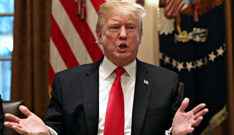 President Trump speaks about tariffs, Thursday, Jan. 24, 2019, in the Cabinet Room of the White House in Washington.