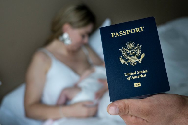 In this photo taken on Jan. 24, 2019, Denis Wolok, the father of 1-month-old Eva's father, shows the child's U.S. passport during an interview with The Associated Press in Hollywood, Fla. Every year, hundreds of pregnant Russian women, like Wolok's wife, Olga Zemlyanaya, travel to the United States to give birth so that their child can acquire all the privileges of American citizenship.