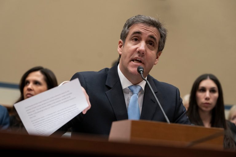 Michael Cohen, President Donald Trump's former personal lawyer, reads an opening statement as he testifies before the House Oversight and Reform Committee on Capitol Hill in Washington, Wednesday, Feb. 27, 2019. 