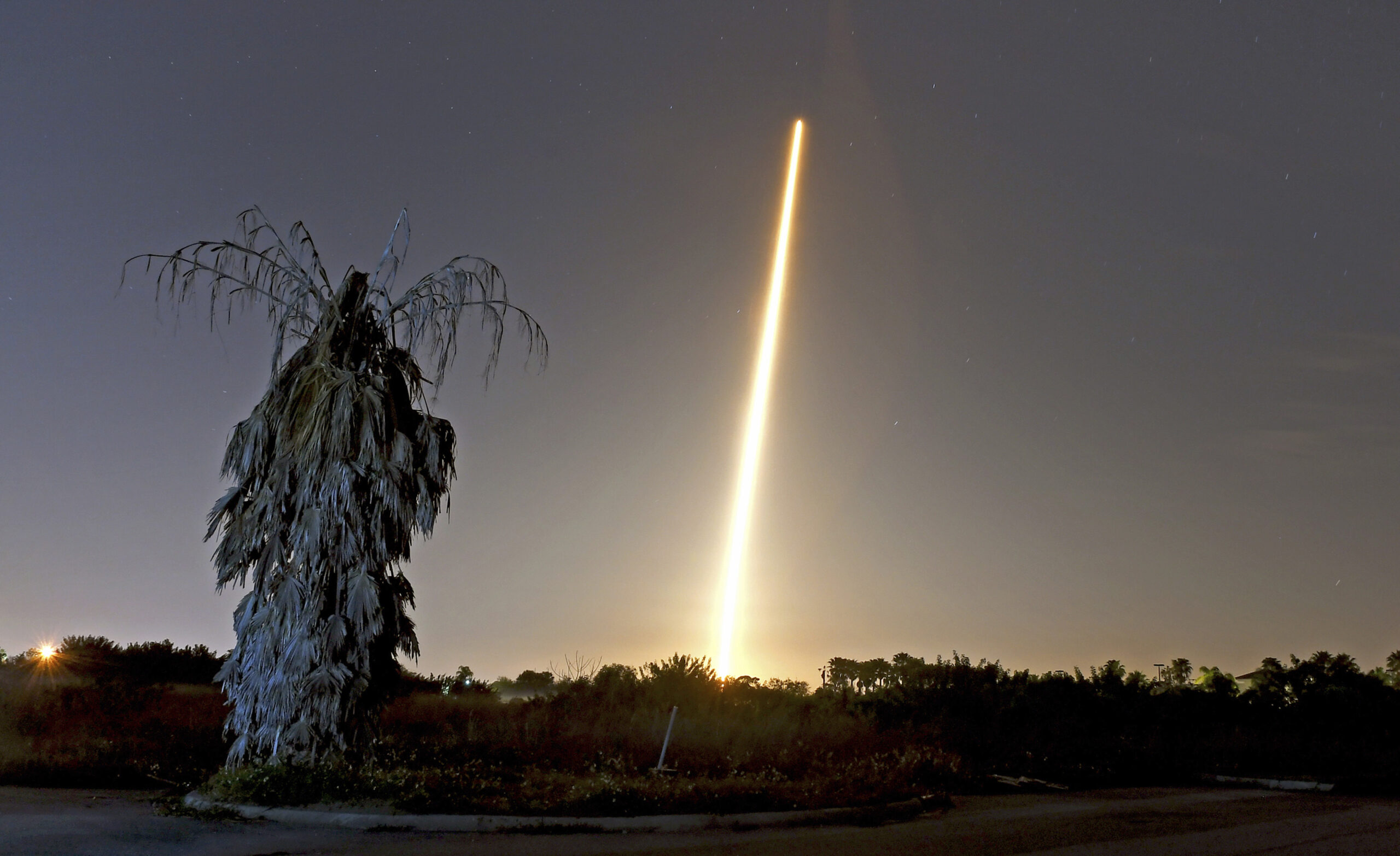 Crew capsule rockets toward space station with test dummy