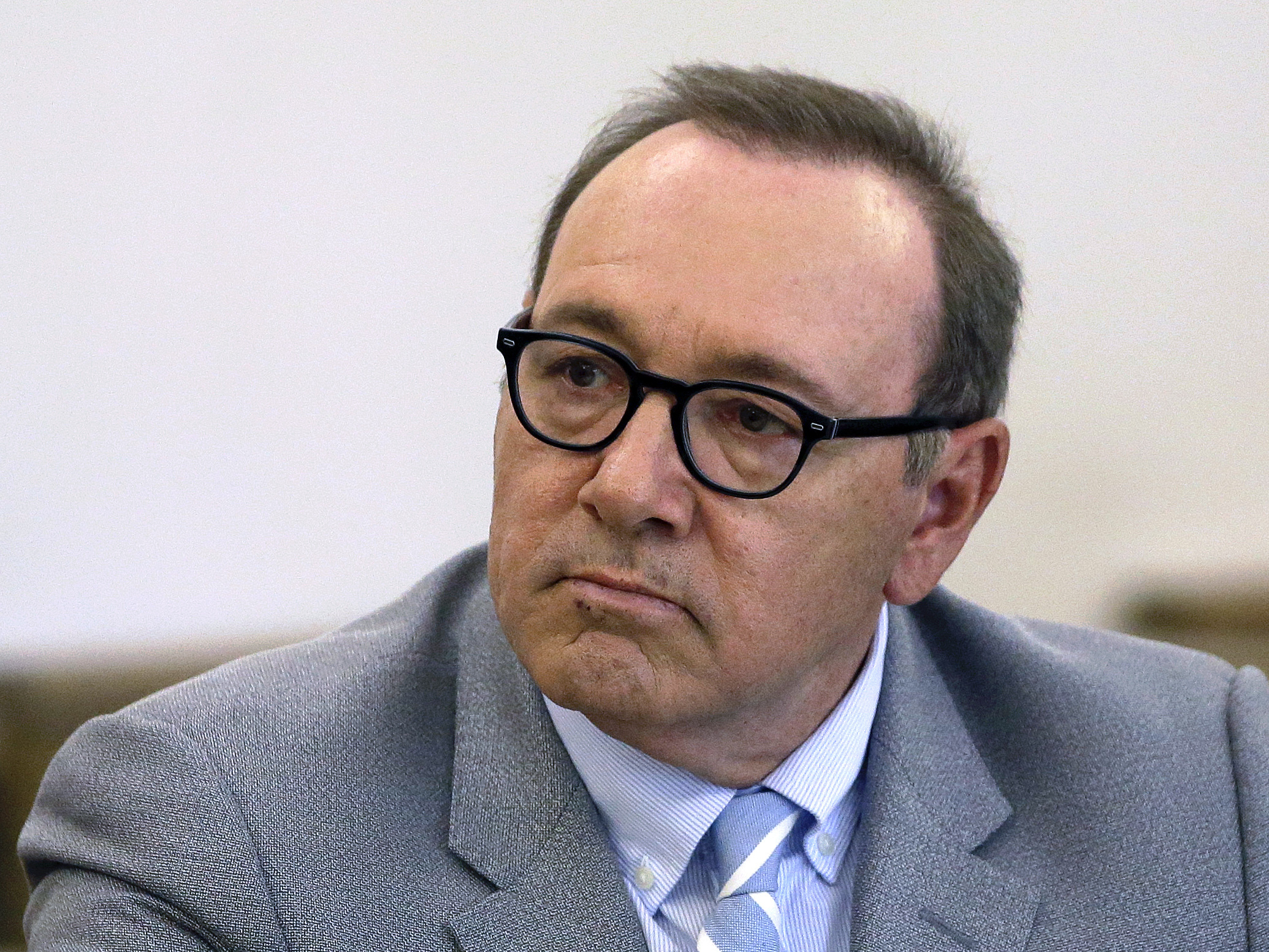 Kevin Spacey charged with four counts of sexual assault in the UK