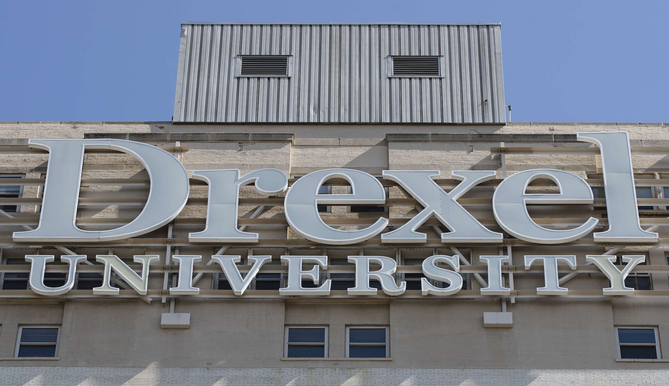 Professor charged with theft after spending $96,000 in federal grants on strippers