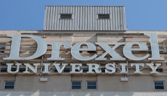 Professor charged with theft after spending $96,000 in federal grants on strippers