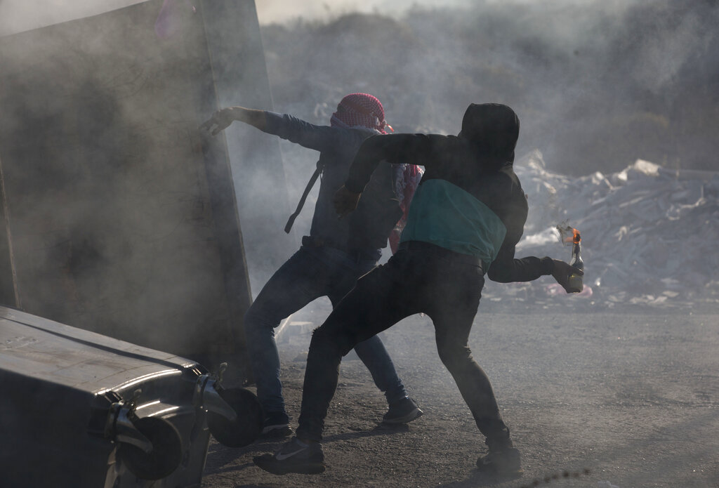 VIDEO: Terrorist catches himself on fire while throwing Molotov cocktail