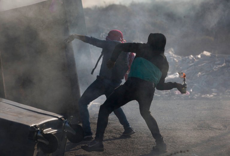 VIDEO: Terrorist catches himself on fire while throwing Molotov cocktail