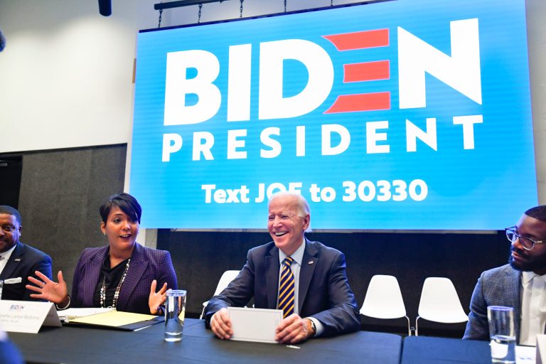 Democratic presidential candidate Joe Biden reacts as he is introduced by Atlanta mayor Keisha Lance Bottoms during an assembly of Southern black mayors Thursday, Nov. 21, 2019 in Atlanta.