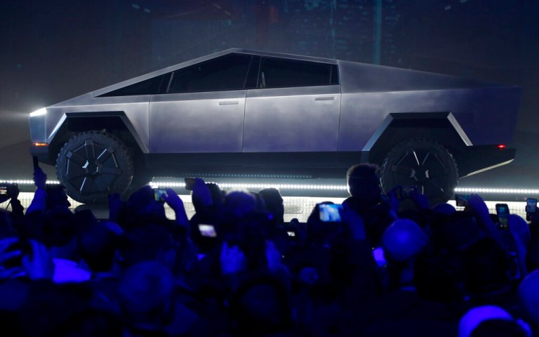 The Tesla Cybertruck is unveiled at Tesla's design studio Thursday, Nov. 21, 2019, in Hawthorne, California.